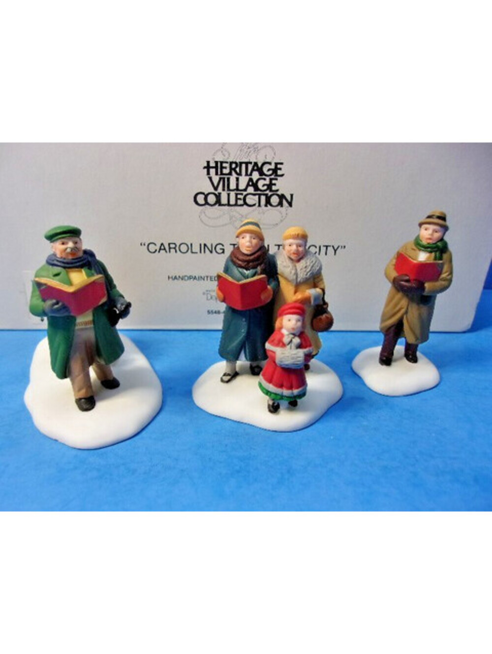Dept 56 Christmas in the City #5548-4 Caroling thru the City Set of 3 Figures